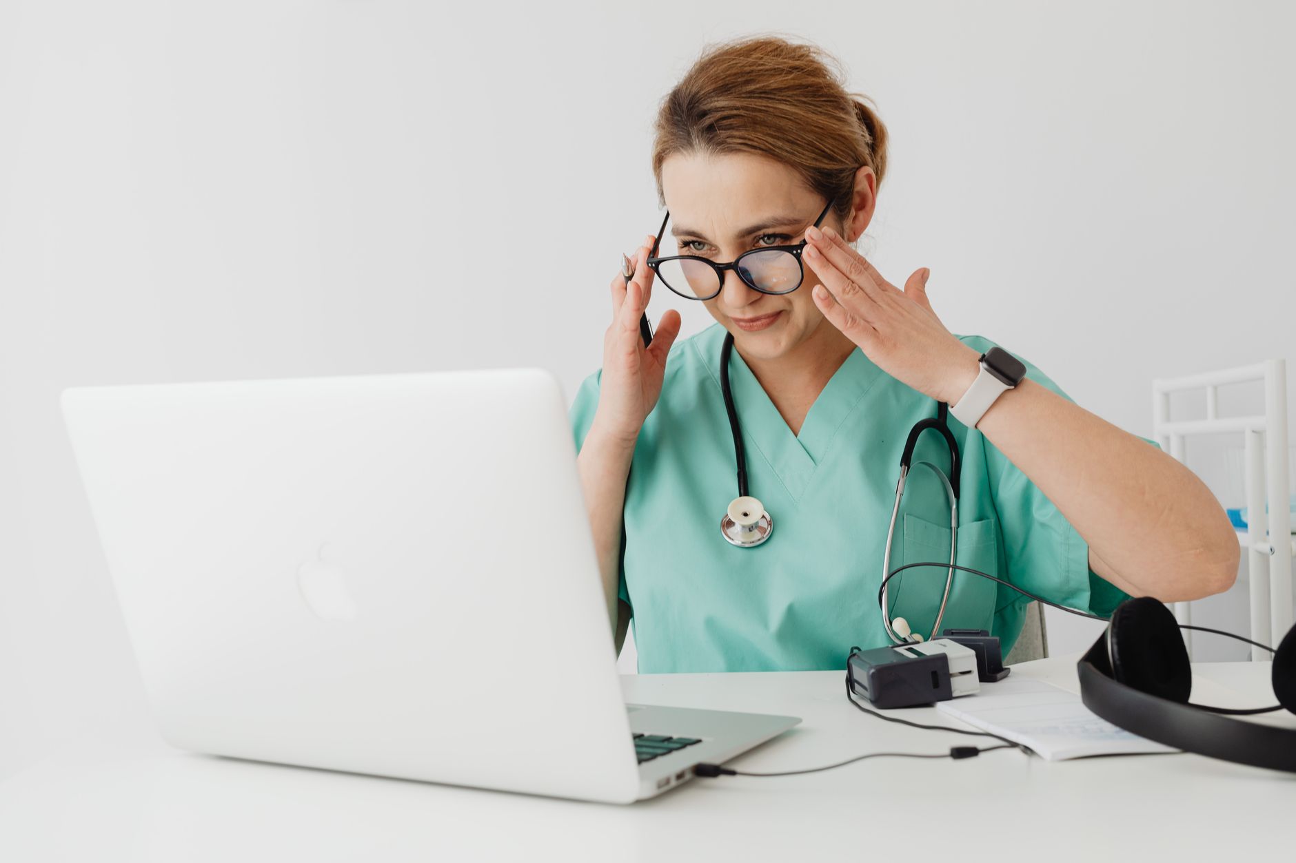Nurse practitioner conducting a telehealth primary care visit for a patient in Northern California